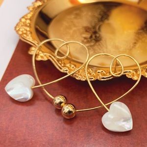 Pearl heart shape hoop earrings